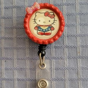 Retractable clip on badge/ID holder